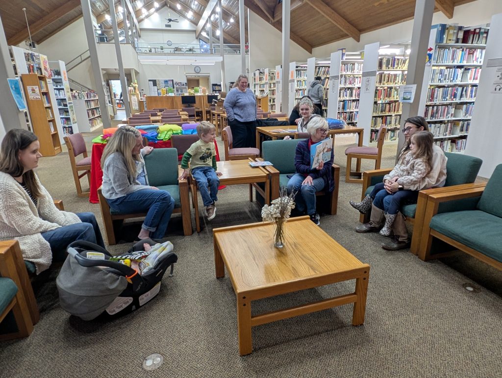 Lauren Jarroll does a read-aloud for the children and their parents at Summersville Public Library.