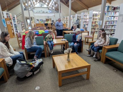 Lauren Jarroll does a read-aloud for the children and their parents at Summersville Public Library.